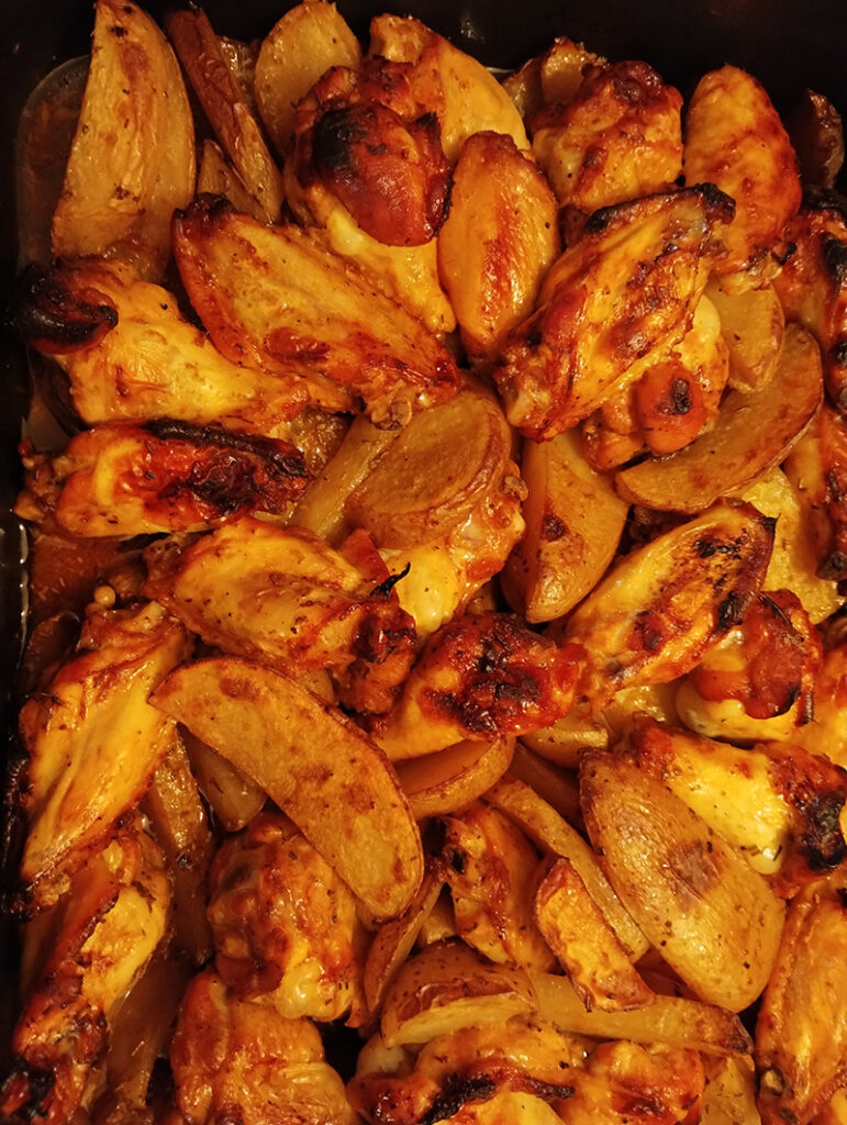 Pollo piccante con patate cottura forno a legna